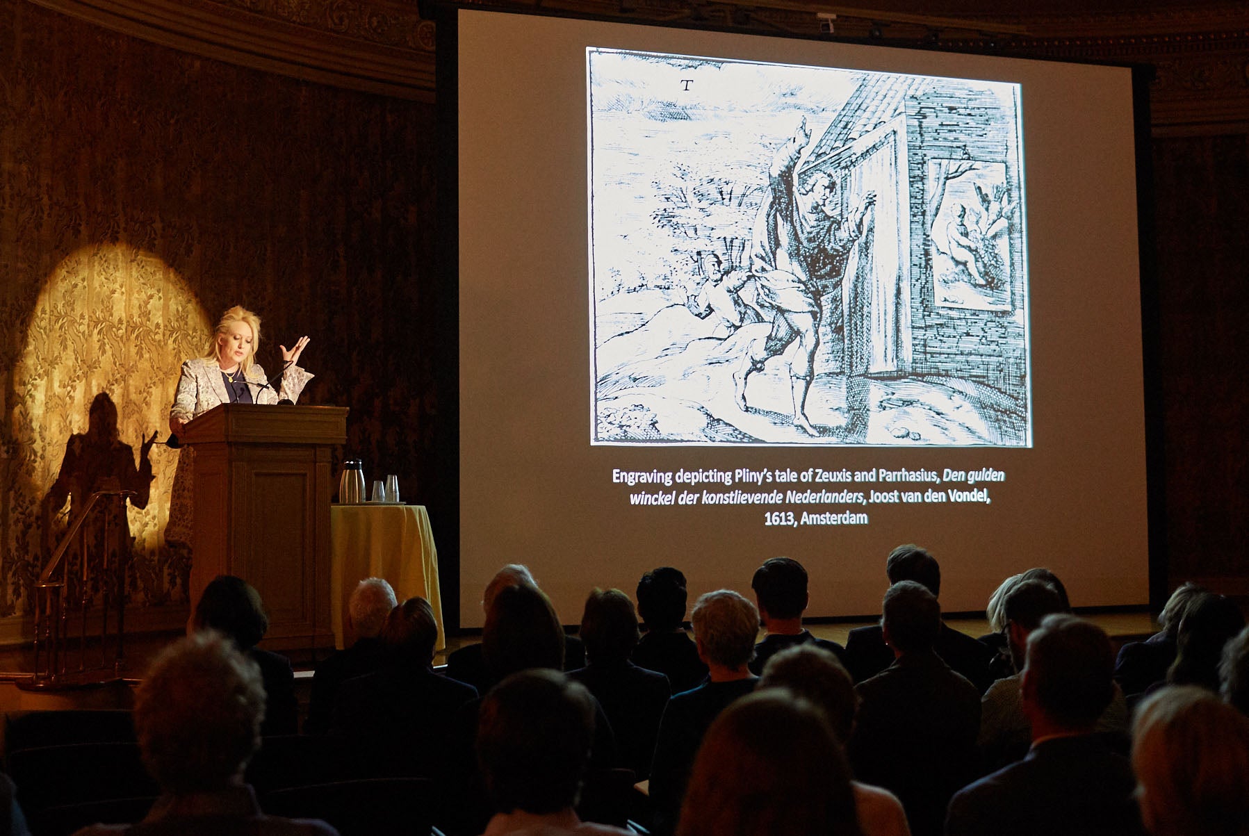Color photograph of Dr. Emily L. Spratt presenting at the 2018 conference, "Searching Through Seeing."