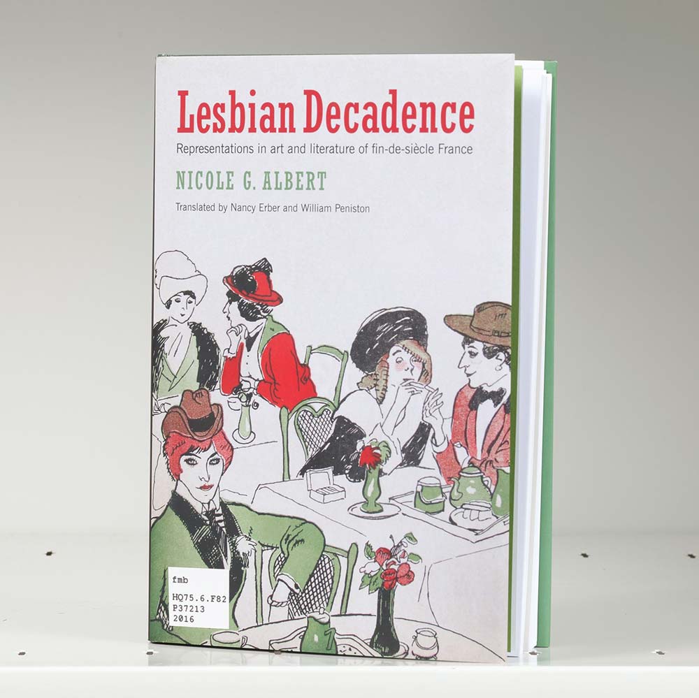 Book on a white shelf with a drawing of women in hats at a cafe