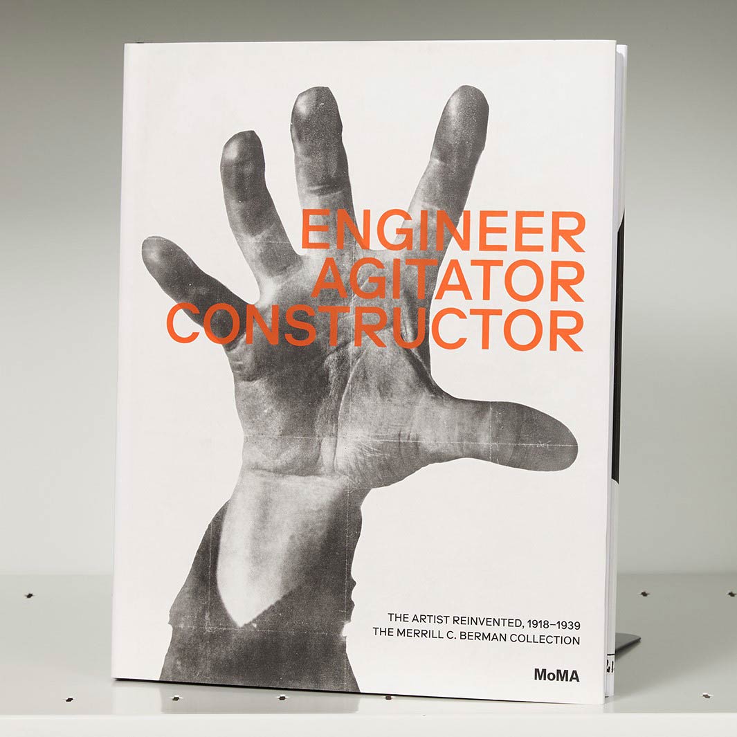 Book cover featuring a large hand grabbing the title word "Engineer, Agitator, Constructor"