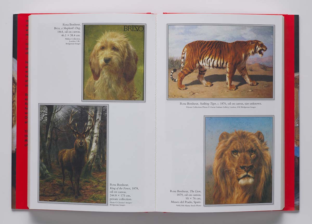 Book spread featuring paintings of a dog, a deer, a tiger, and a lion