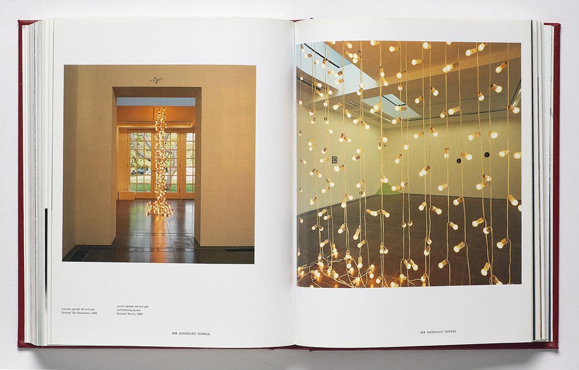 Book spread featuring images of an art installation with groups of string lights