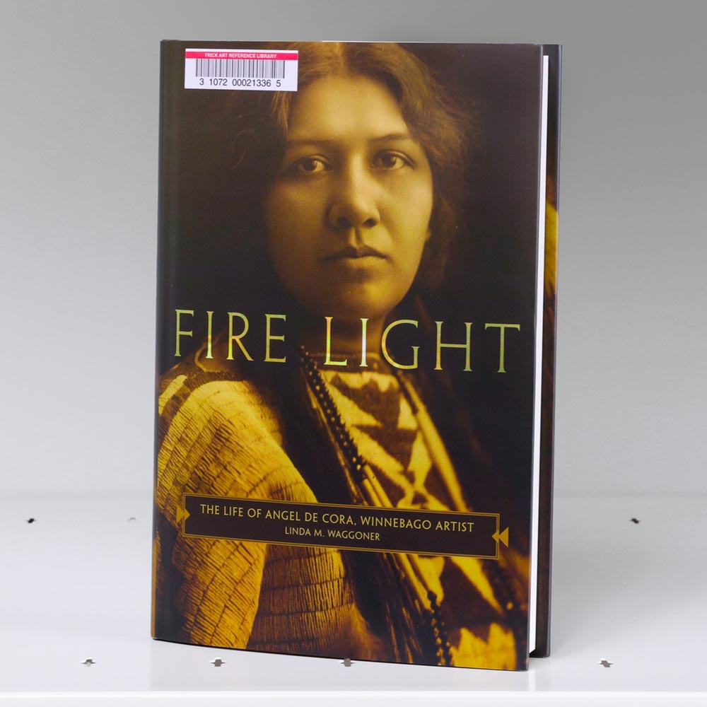 Book cover featuring a sepia photo of a Winnebago woman