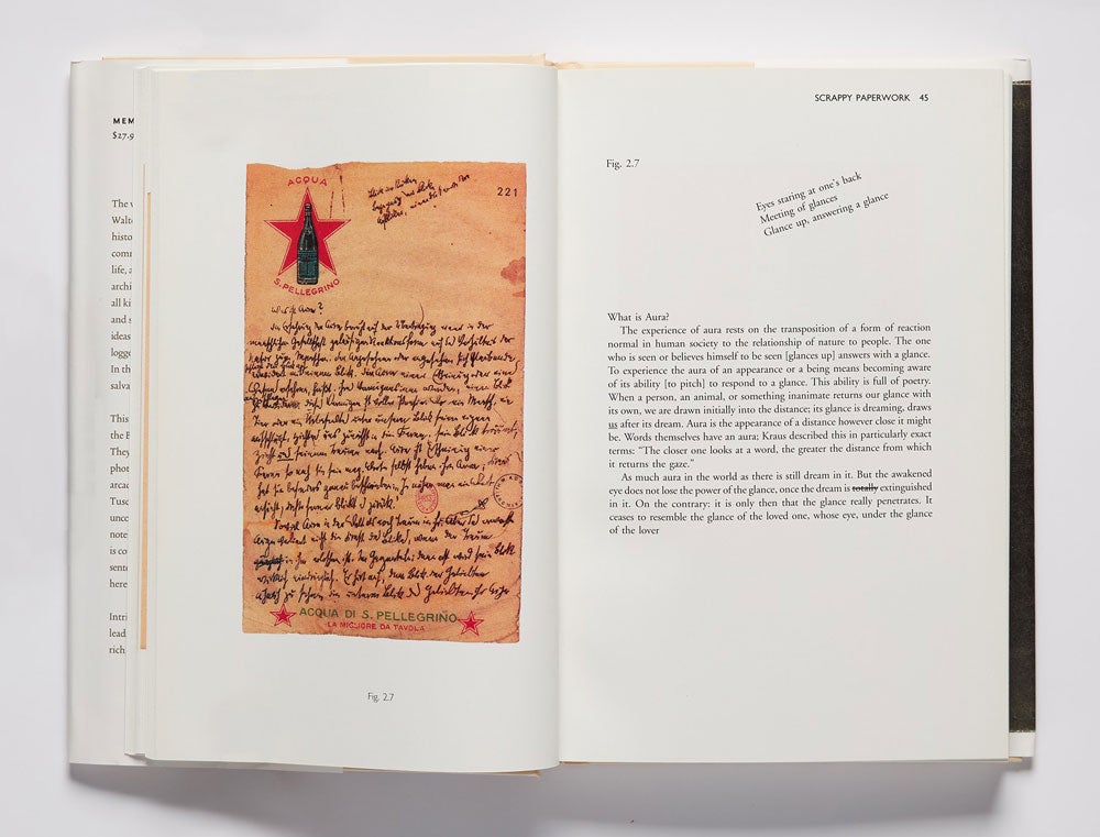 Book spread featuring an image of text handwritten on a San Pellegrino advertisement