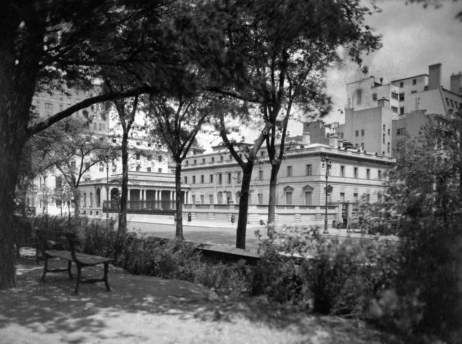 A mansion in New York City viewed from across the street in Central Park