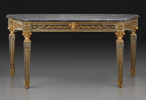 blue-gray marble table with gilt bronze decorations by Gouthière