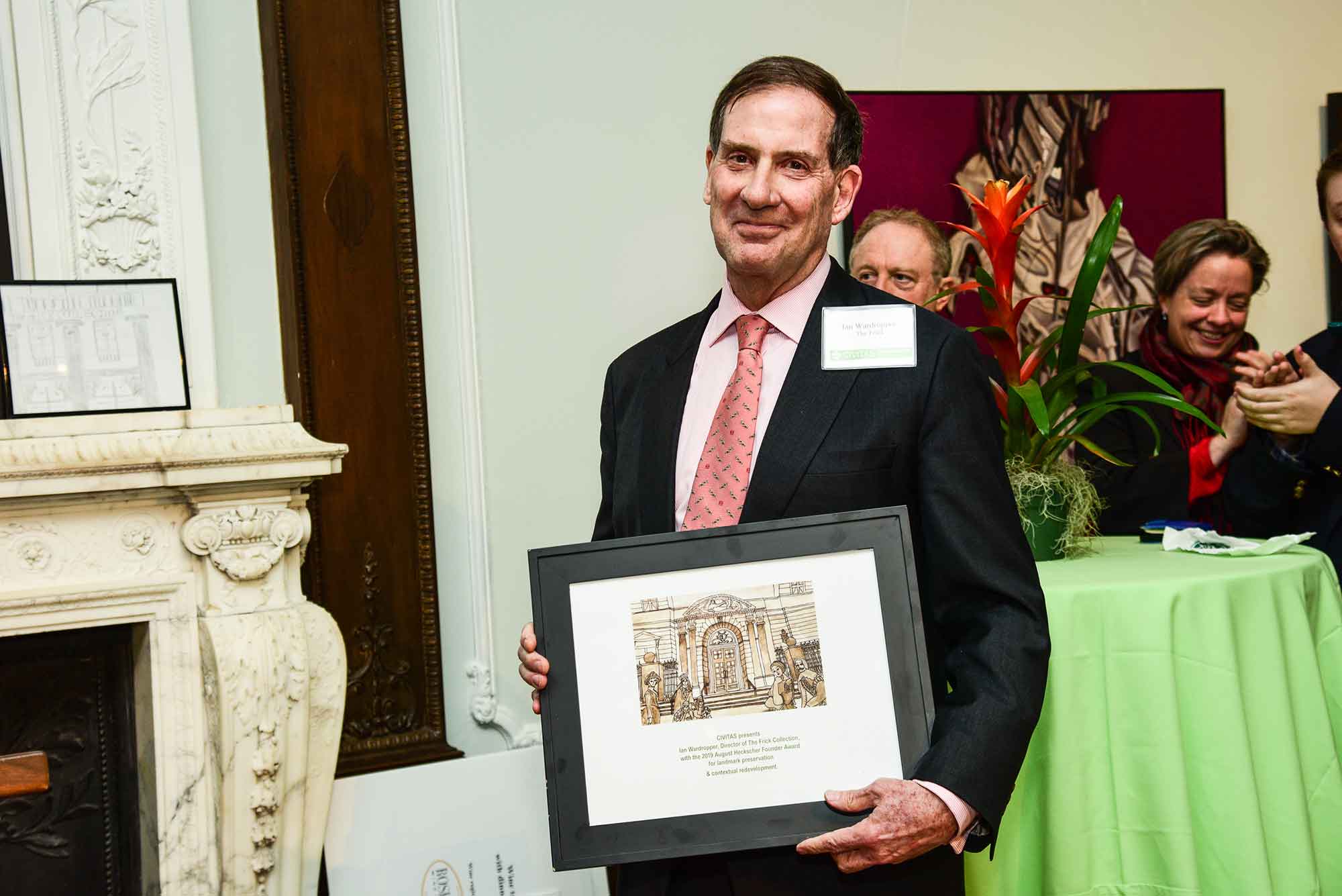 Ian Wardropper standing with award