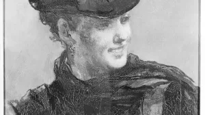 Black-and-white image of a portrait of a woman in a hat looking to the left and smiling.