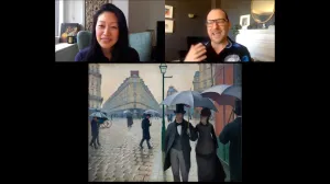 video still of two Aimee Ng and Emerson Boyer speaking over painting