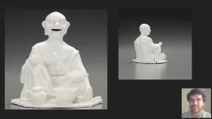 video still of Armanis Fuentes with laughing Buddha incense burner