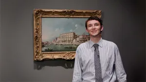 video still of Andersson Perry in front of painting with 