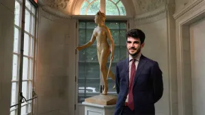 video still of Giulio Dalvit standing in front of sculpture of nude woman in gallery