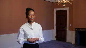 video still of Marie-Laure Buku Pongo talking in gallery