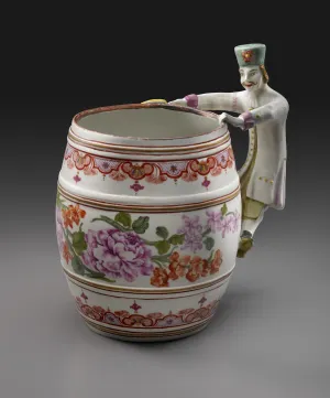 colorful porcelain tankard with male figurine as handle