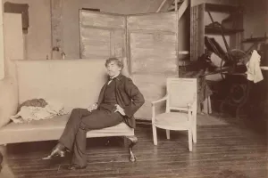 photo of James Whistler seated in studio
