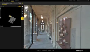 still of program showing floorplan on left, and photo of gallery on left