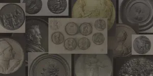 Series of medals against a dark background