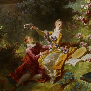 A seated woman in a yellow dress placing a crown of flowers on the head of a man in a red outfit