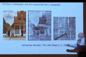 Man giving lecture on thread count of painting