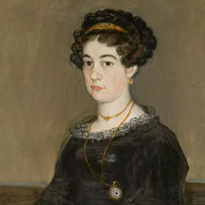 young woman with dark curly hair in black dress