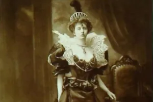 sepia photo of woman in dress and crown