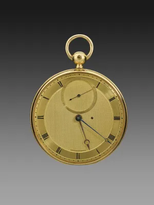 gold pocket watch with tourbillon