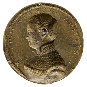Backside of bronze medal with profile of a woman facing left