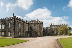 photo of Auckland castle under bright blue sky