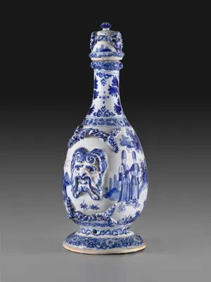 One side of an earthenware gourd-shaped vessel with a raised portrait