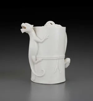 cylindrical white teapot with dragon spout