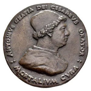 Bronze medal of a man in profile.