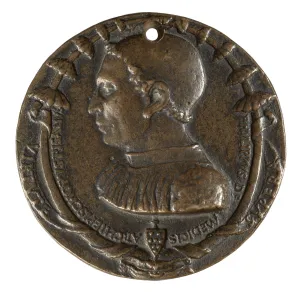 Bronze medal depicting a man in profile.