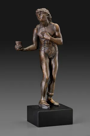 Plaster cast sculpture of a standing nude man beating his chest with a stone.