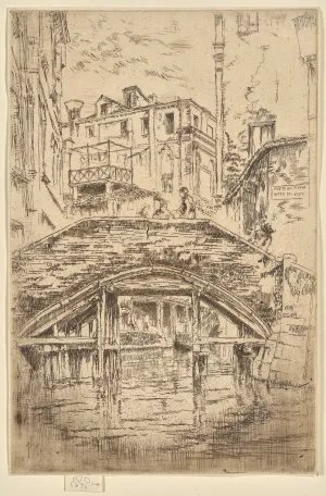 Bridge over a canal with buildings on either side