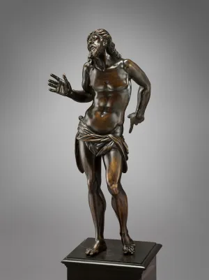 Bronze stature of a standing man.