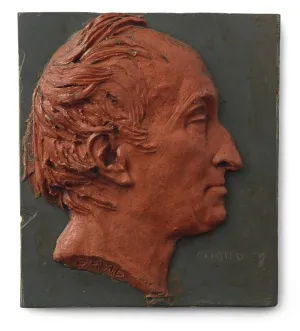 sculpted red wax head of balding man in profile against slate background