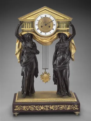 clock depicting two carytids, (carving of a draped female figure, used as a pillar to support the entablature of a Greek building) in black bronze holding golden clock in Greek architecture