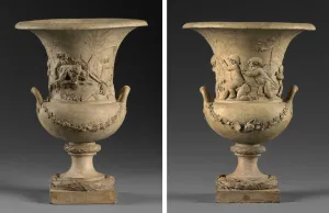 Alternate view of a pair of terracotta vases with mythological figures and decorative elements