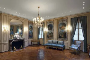 frick gallery with paintings on wall and furniture