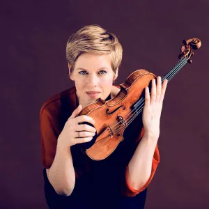 woman holding violin