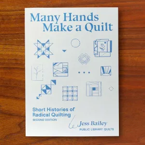 Zine cover with quilt patterns and title "Many Hands Make a Quilt"
