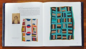 Book open to a spread with a photo of a woman and two vibrant quilts
