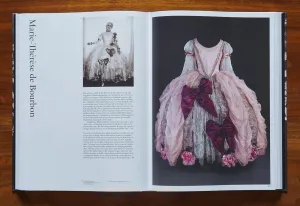Book open to a spread with section title "Marie-Thérèse de Bourbon" with illustrations of a woman in an elaborate costume gown lined with huge bows and an image of the actual garment 