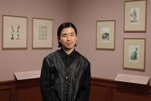 Yifu Liu standing in gallery 