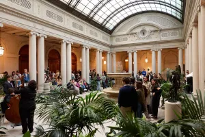 patrons in the Garden Court at the Frick Collection