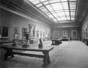 black and white view of gallery with large skylight