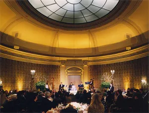 photo of Frick Music Room, including musicians playing for audience