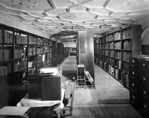 photo of stacks of library on bowling alley, circa 1923
